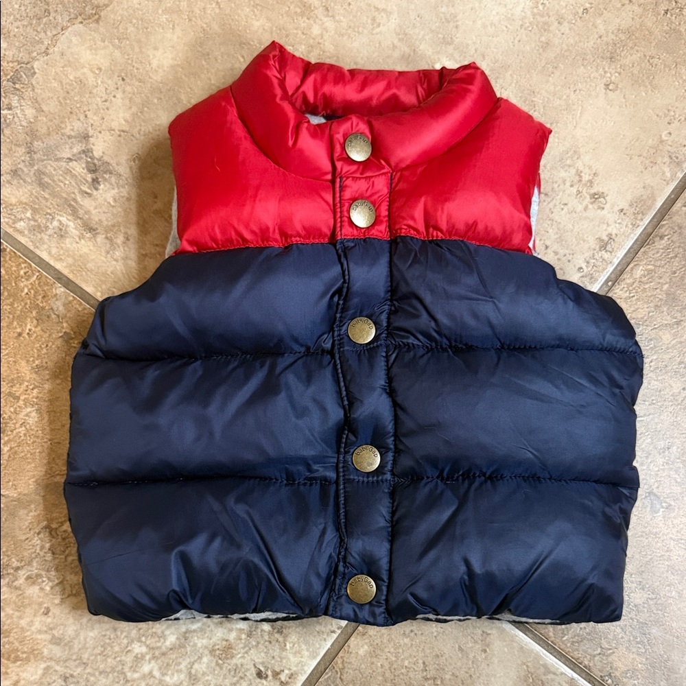 Gap Baby Boy’s Red and Navy Puffer Vest with snap closure. Size 6-12 months.